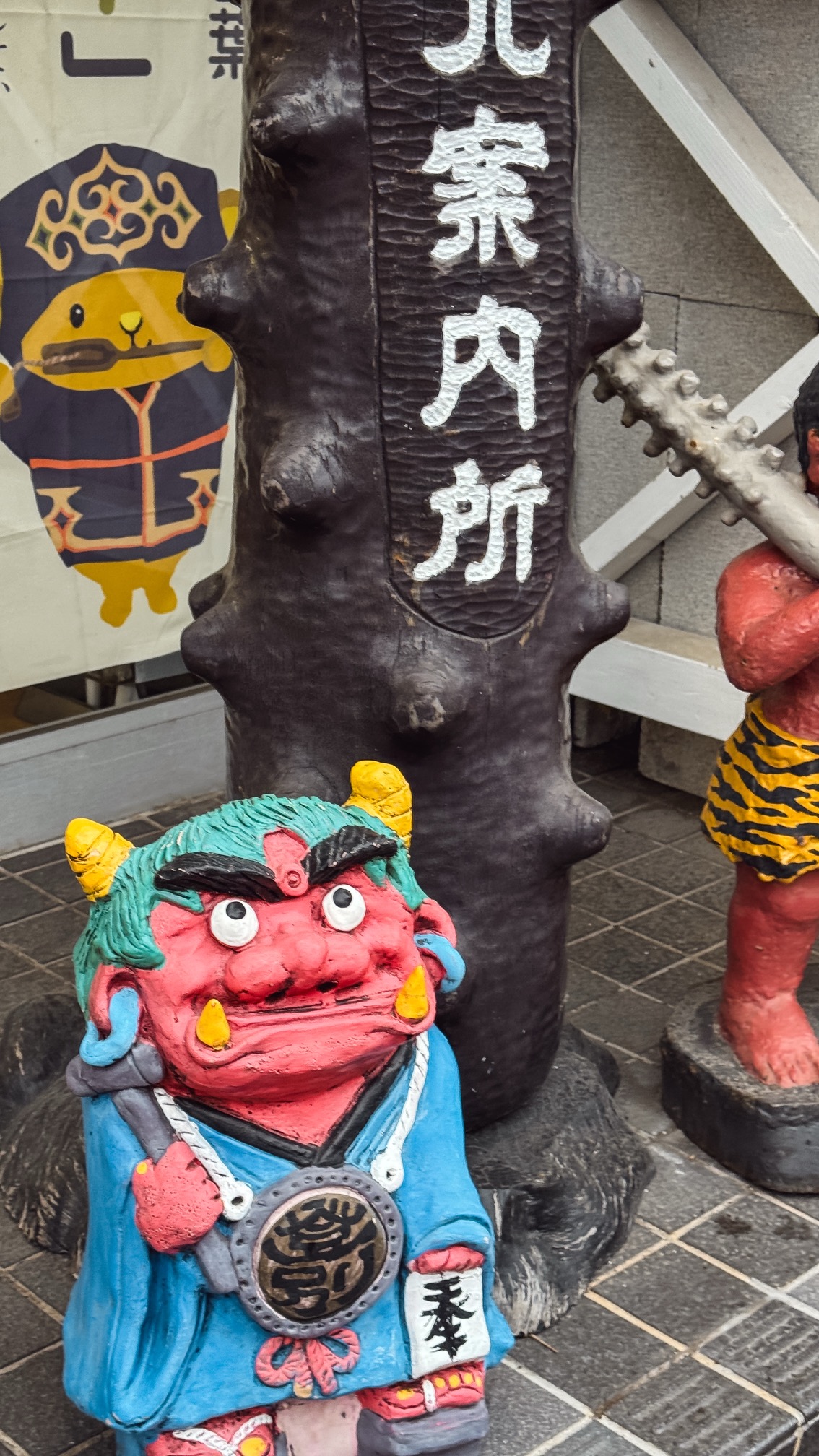Traditional Japanese onsen town nestled in valley with forested mountains, Noboribetsu