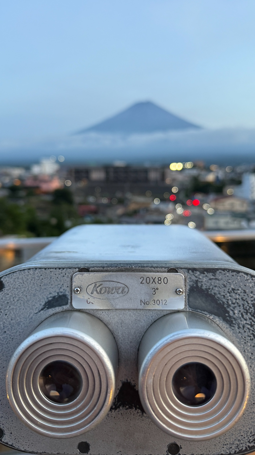 Binoculars on the ryokan terrace looking toward Mount Fuji