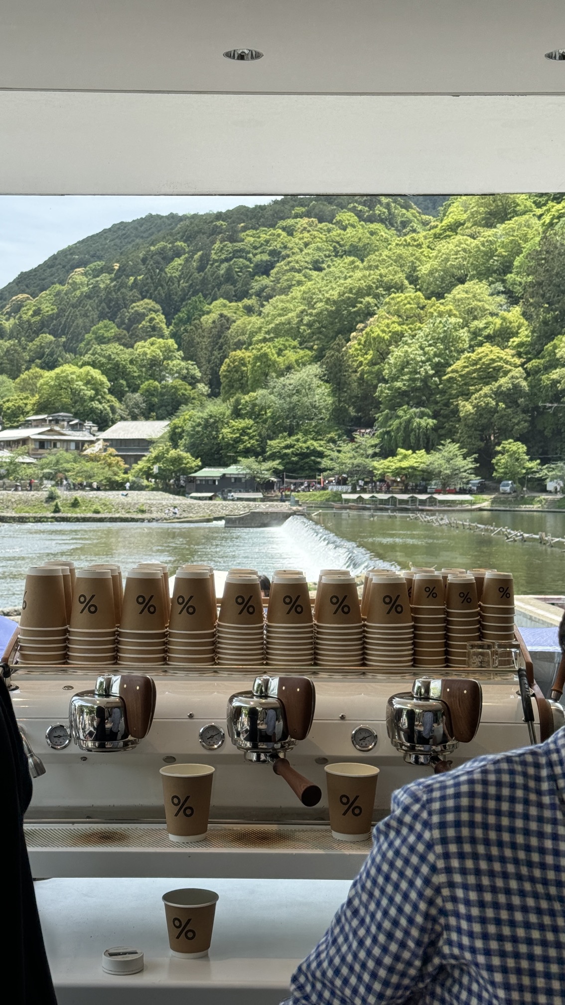 % Arabica coffee bar overlooking river with mountain views, Arashiyama