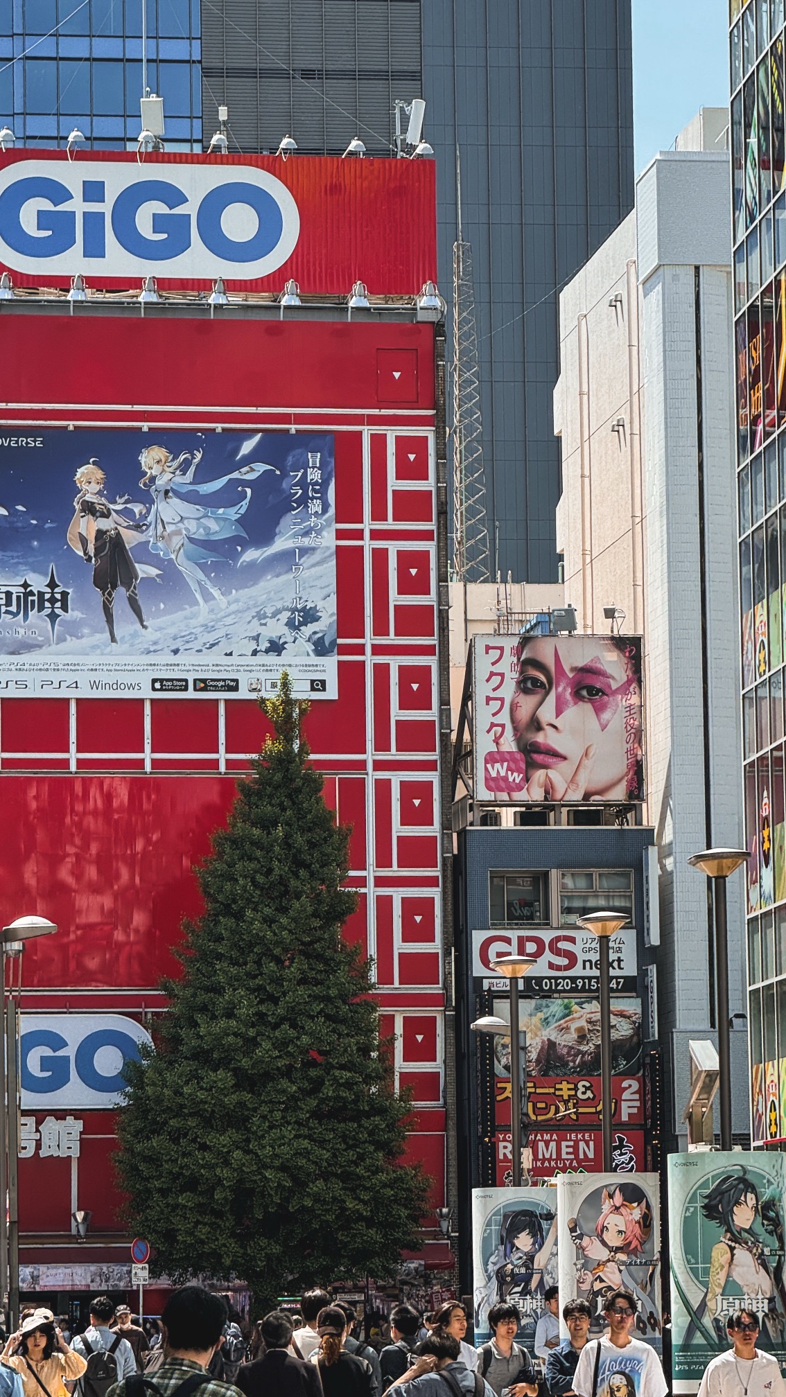 Akihabara electronics district with colorful shop signs and neon advertisements