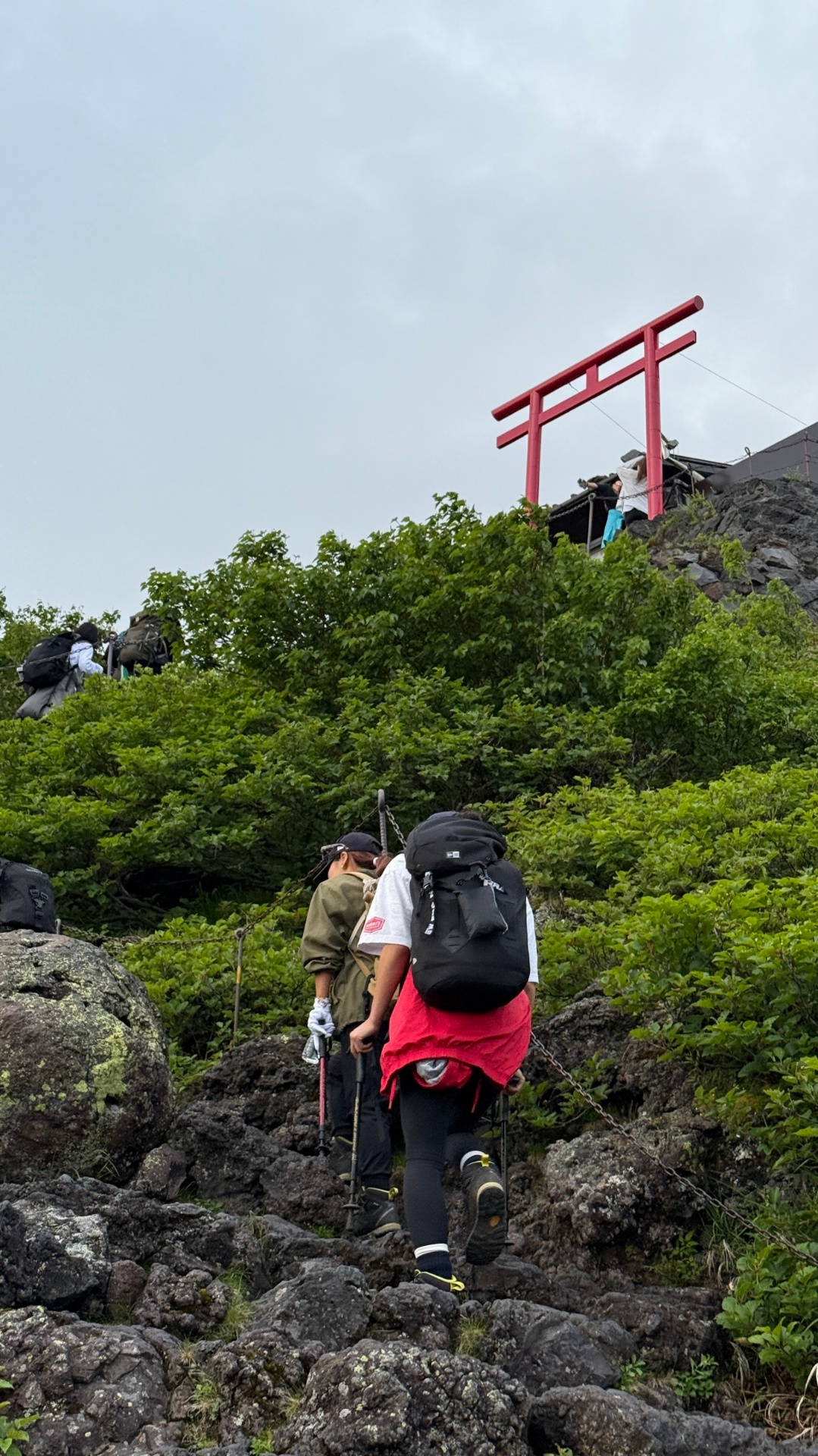 Volcanic red rock along the ascent