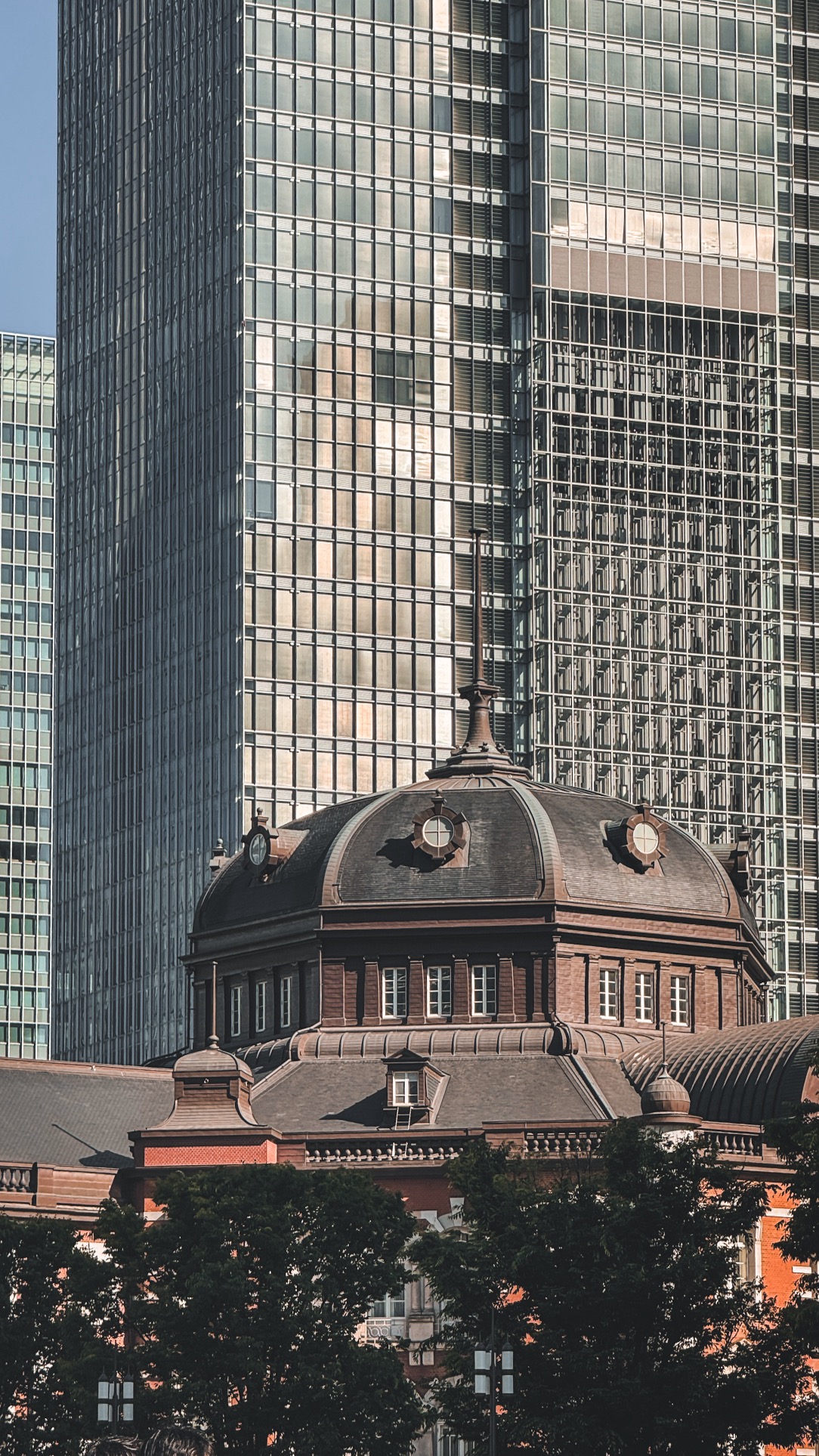 Tokyo Station interior with modern architecture and busy passenger activity