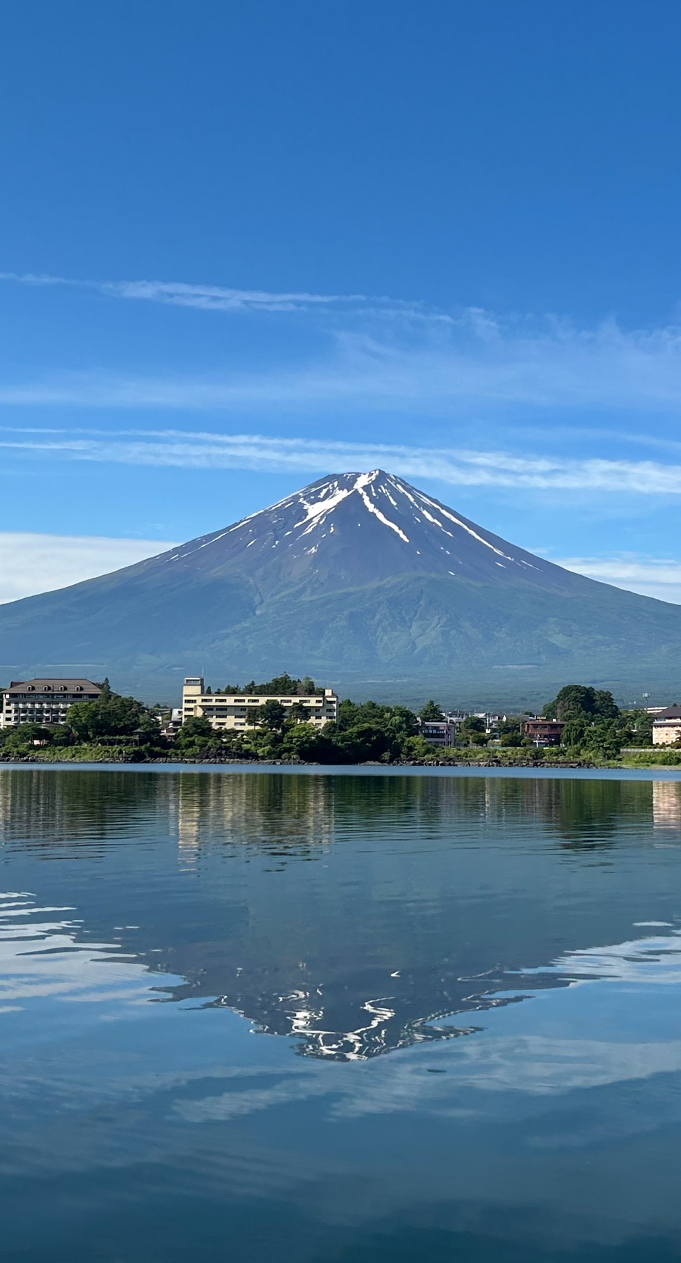 Mount Fuji reflected in the still waters of Lake Kawaguchiko